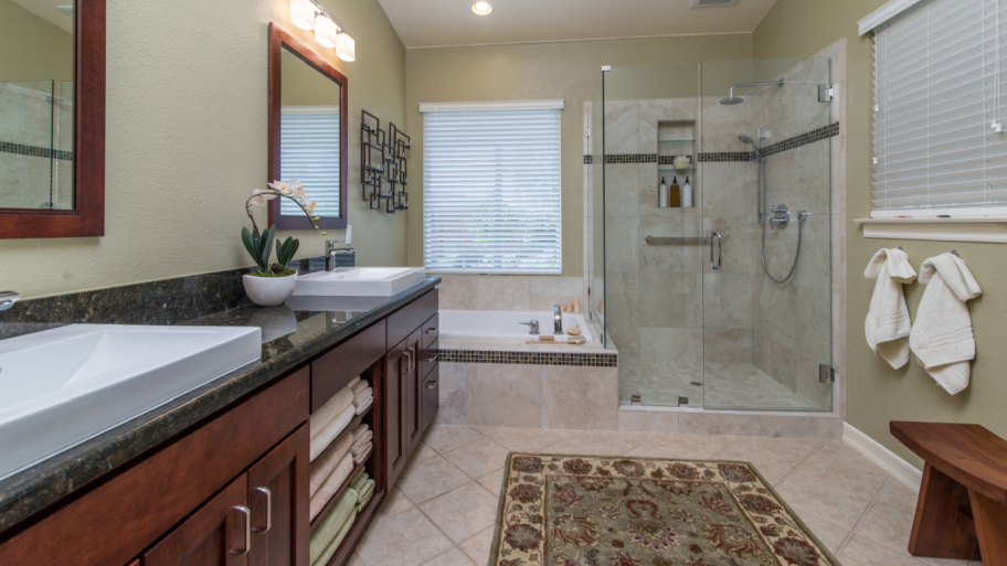 bathroom with wood vanity